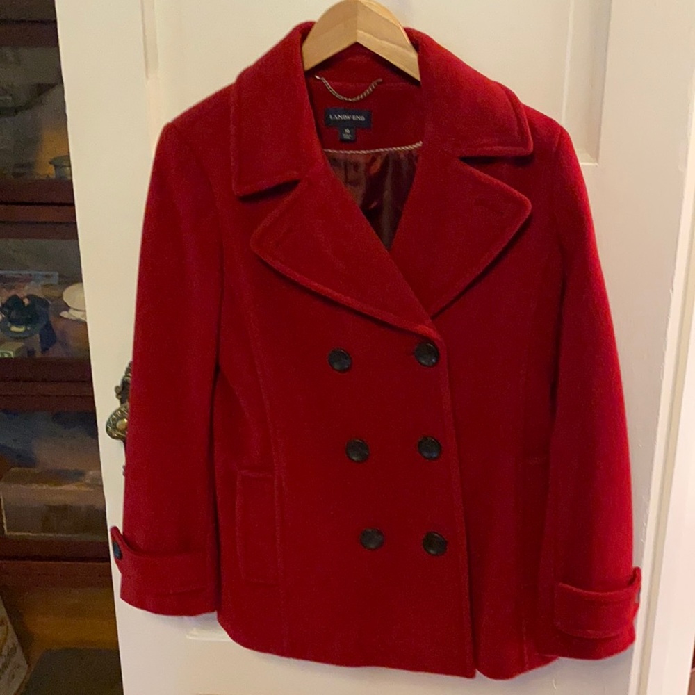 Classic women’s wool pea coat with notched collar.